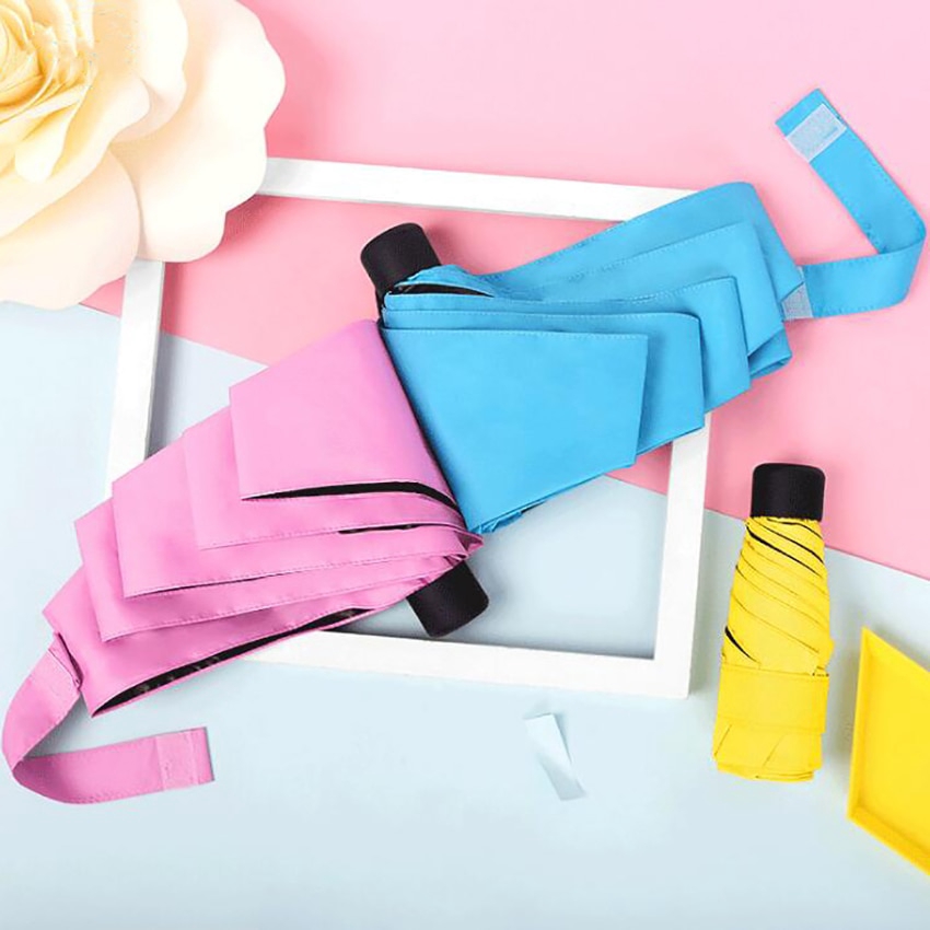 Ô dù mini gấp gọn bỏ túi siêu nhẹ dùng đi du lịch