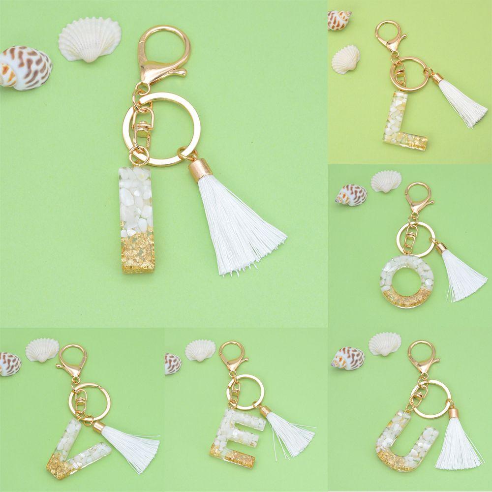 Móc Khóa Có Dây Tua Rua In Chữ SHOUKEY Chất Liệu Resin Cho Cặp Đôi