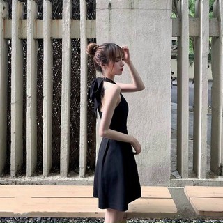 Đầm xoè đen cổ yếm thắt nơ hở lưng (ảnh thật)