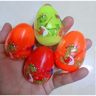 Trứng khủng long đồ chơi có kẹo cho bé