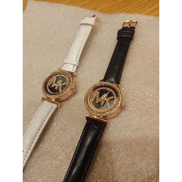 Đồng hồ dây da nữ Michael kors đá xoay