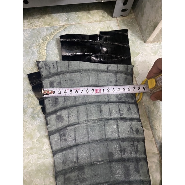 Da cá sấu đen bóng