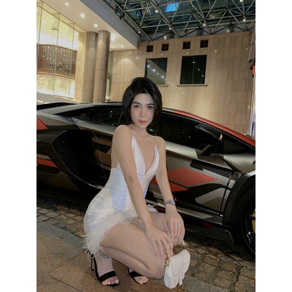 Đầm body 2 dây đính đá phối lông vũ