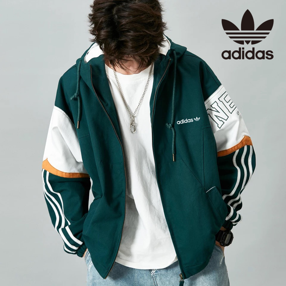 Áo Khoác Gió Họa Tiết Adidas Và Cỏ Ba Lá Có Mũ Trùm Đầu Mặc Thường Ngày