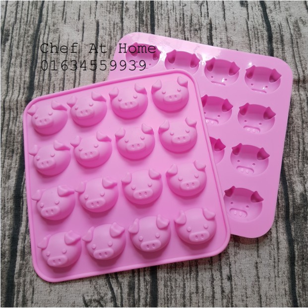 Khuôn silicone hình mặt heo