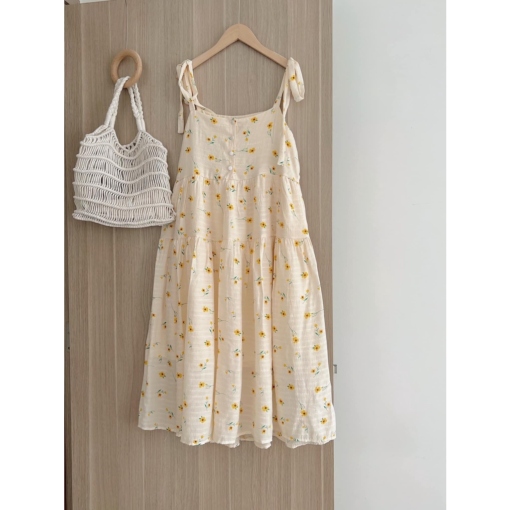 [Mẫu chụp ảnh thật] Váy 2 dây hoa nhí vàng thắt nơ vai dáng xòe - Đầm babydoll 2 dây hoa be cài cúc ngực