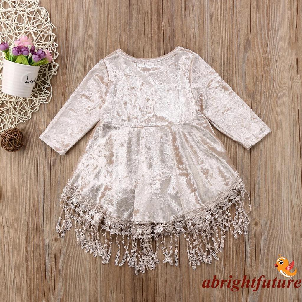Đầm nhung thắt nơ cho bé gái