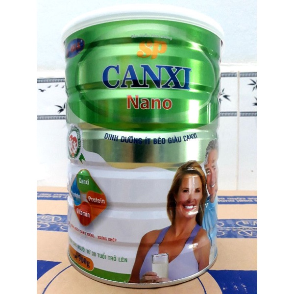 Sữa bột sản phẩm dinh dưỡng SP Canxi Nano ít béo giàu canxi lon 900 gram