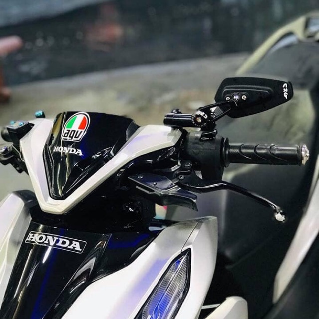 Kính CRG gù gắn trên chân kính