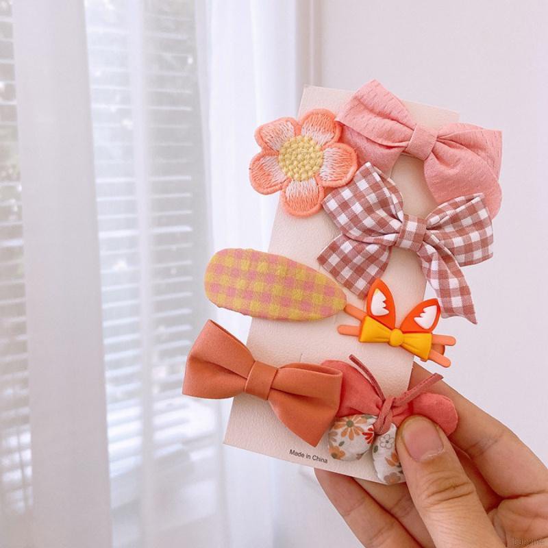 Kẹp tóc hình nơ màu kẹo ngọt ngào đáng yêu cho bé