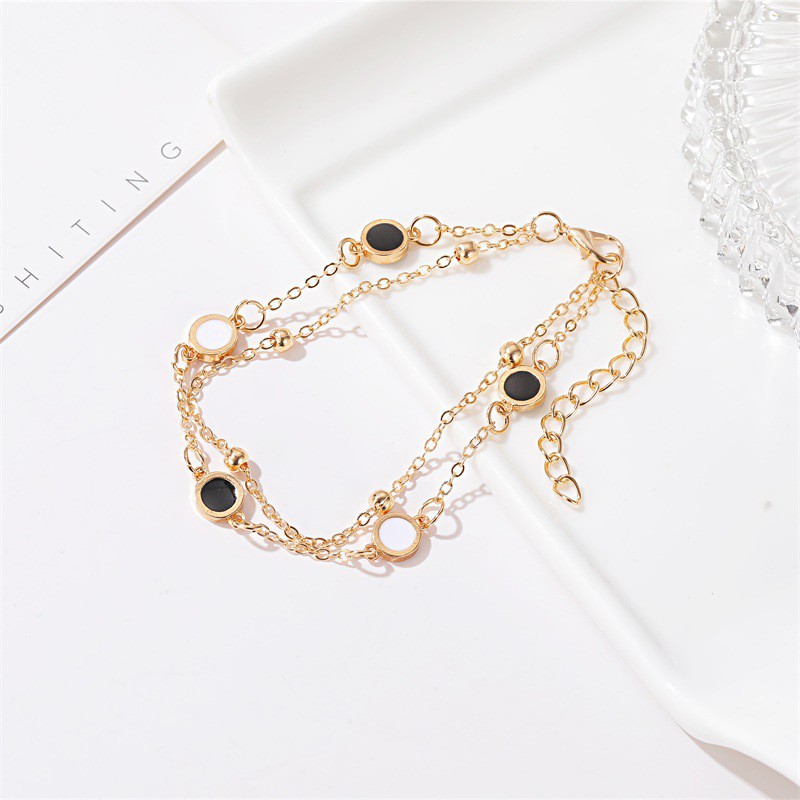 Vòng tay hai lớp đính hạt vỏ sò đen và trắng thời trang Hàn Quốc đơn giản dành cho bạn nữ