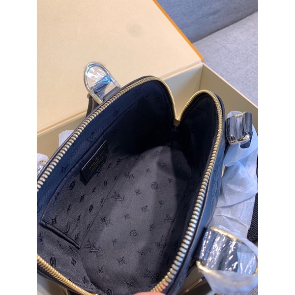 Túi lv hến cầm tay