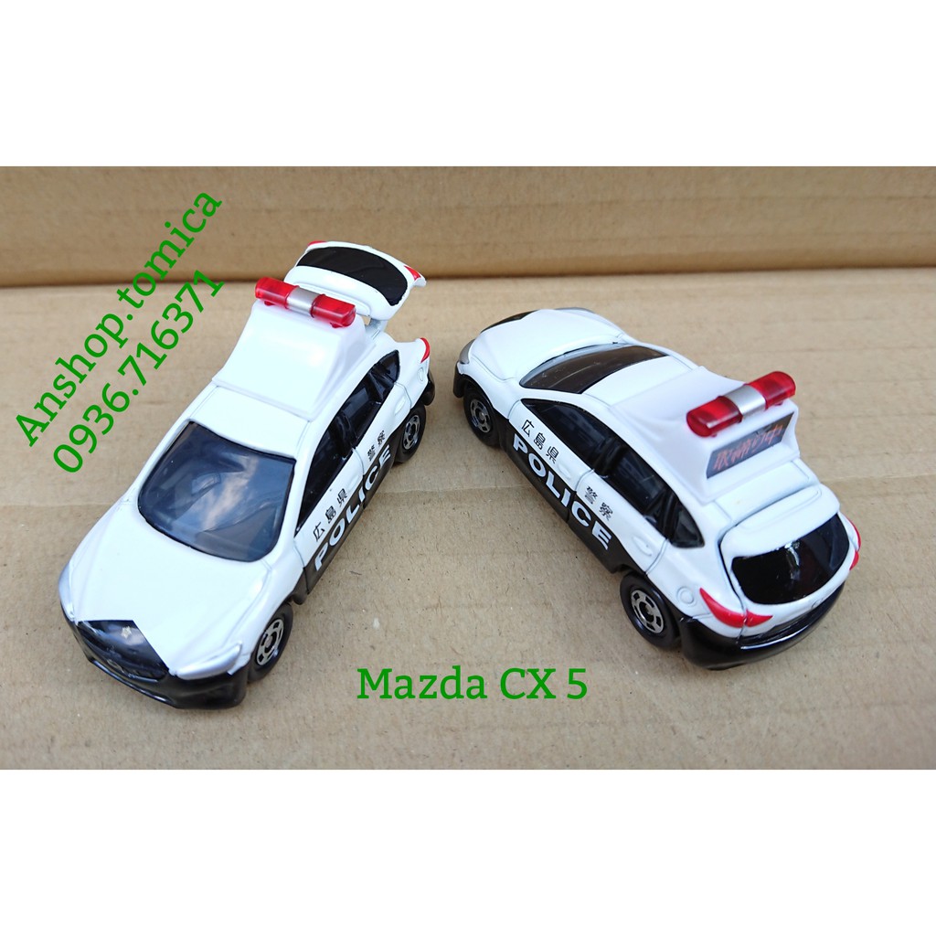 Mô hình xe C. Sát Mazda mở được cốp sau tomica Nhật Bản