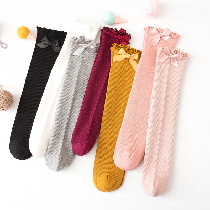 Tất dài chất liệu cotton đính nơ thời trang dành cho bé gái