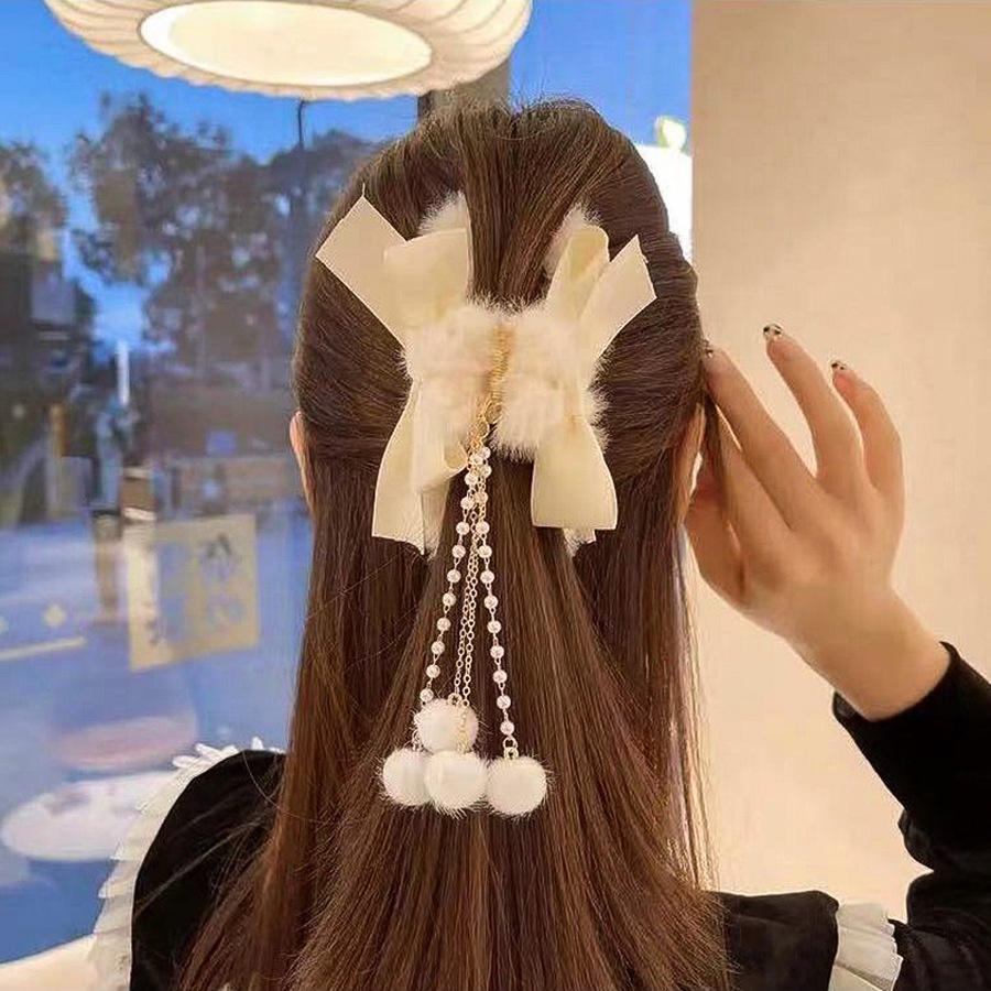 Kẹp tóc nữ đính nơ phối lông thả tua rua thời trang mới Hàn Quốc