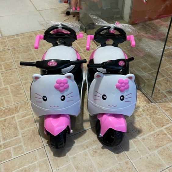 Xe máy điện cho bé hình Minion / sóc/ kitty / Heo