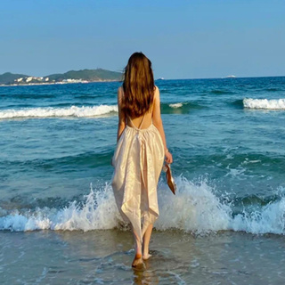 Đầm đi biển hở lưng đính nơ lấp lánh thời trang hè quyến rũ cho nữ
