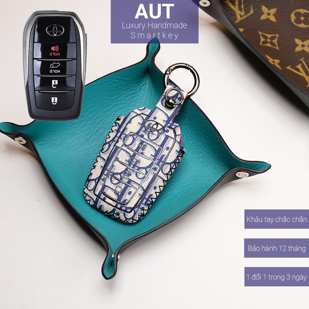Ốp da chìa khóa ô tô Toyota Camry Fortuner Innova V Hilux G Land Cruiser 4 nút bấm Dior khâu tay TFO4 AD