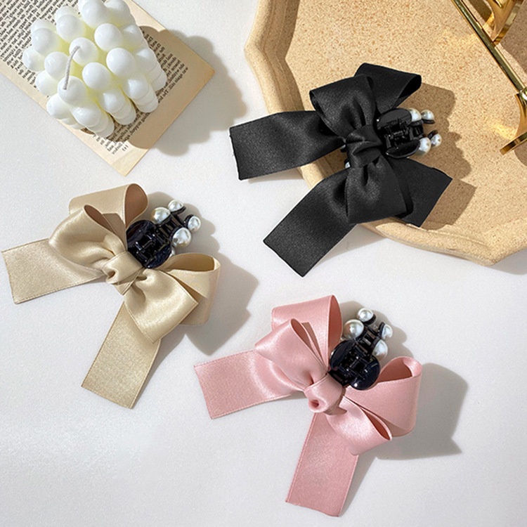 Kẹp tóc hình nơ đính ngọc trai nhân tạo thời trang