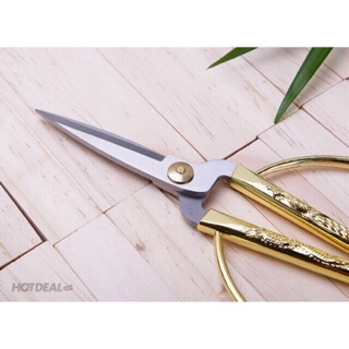 Kéo rồng cán vàng