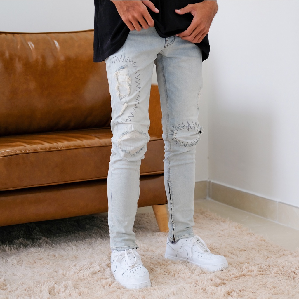 Quần jean nam cao cấp streetwear màu xanh sáng rách thêu form slimfit chất jean co giãn thoải mái.