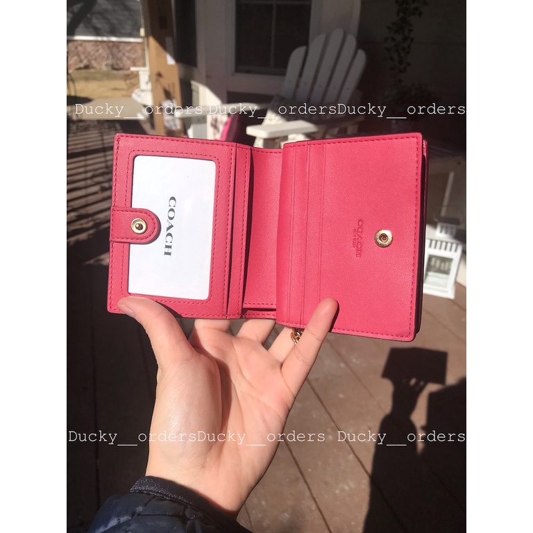 - ví coach snap wallet hồng