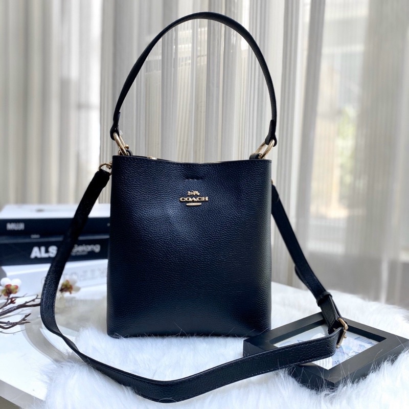 Túi đeo vai kèm dây đeo chéo Co@ch bucket