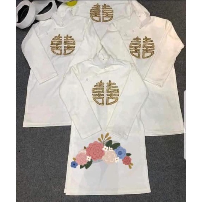 Miếng thêu chữ hỷ trên áo dài- tấm hỷ kết tua rua