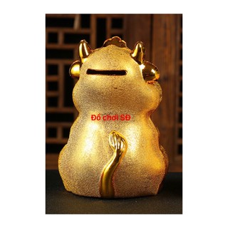 ống heo - hình con trâu vàng