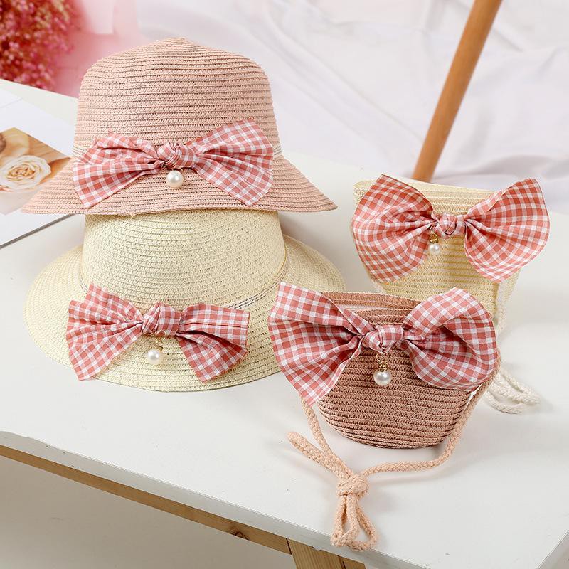 Set mũ cói đính nơ vải + túi xách cói đi biển thời trang cho bé gái