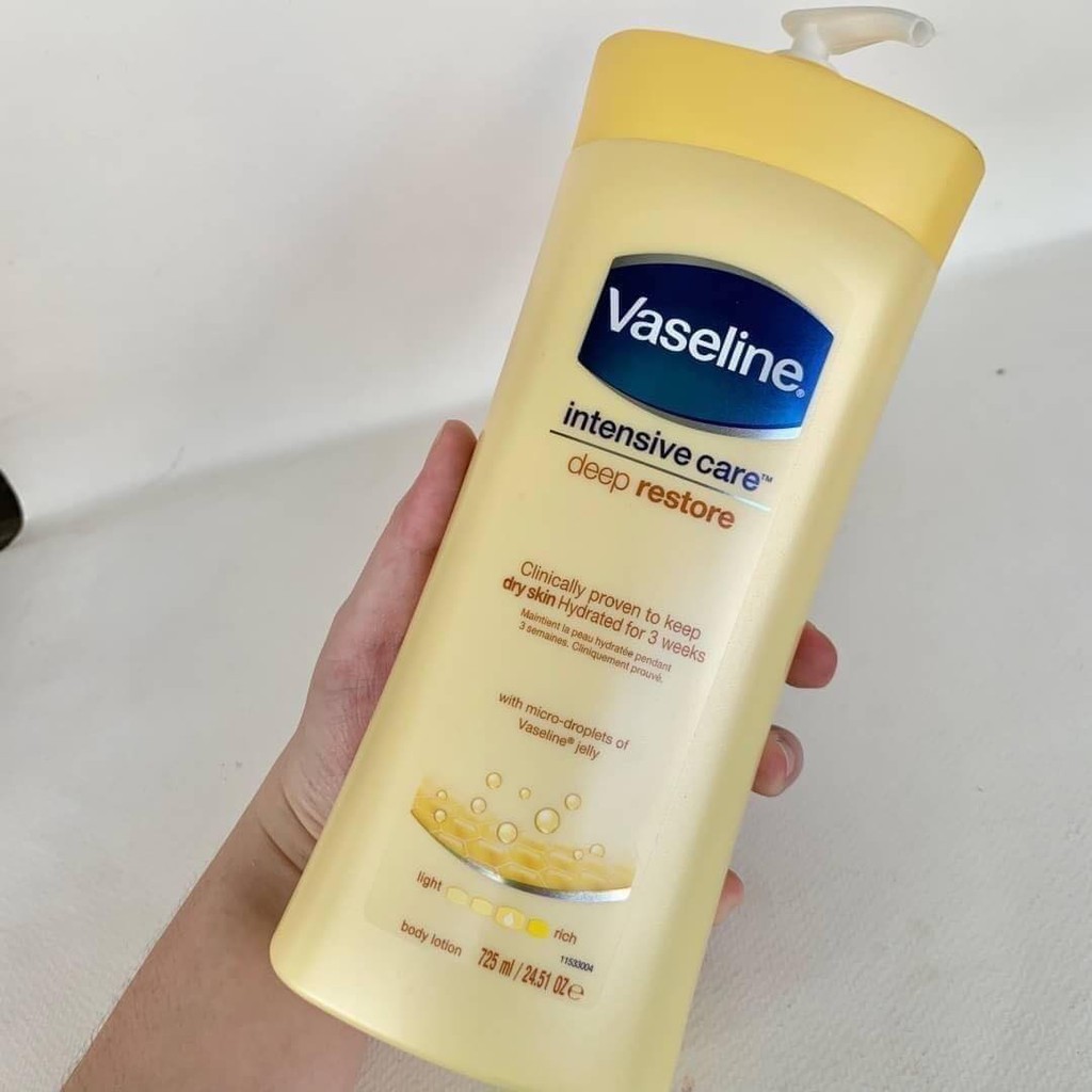 Sữa dưỡng thể Vaseline Intensive Care Deep Restore 725ml Vàng