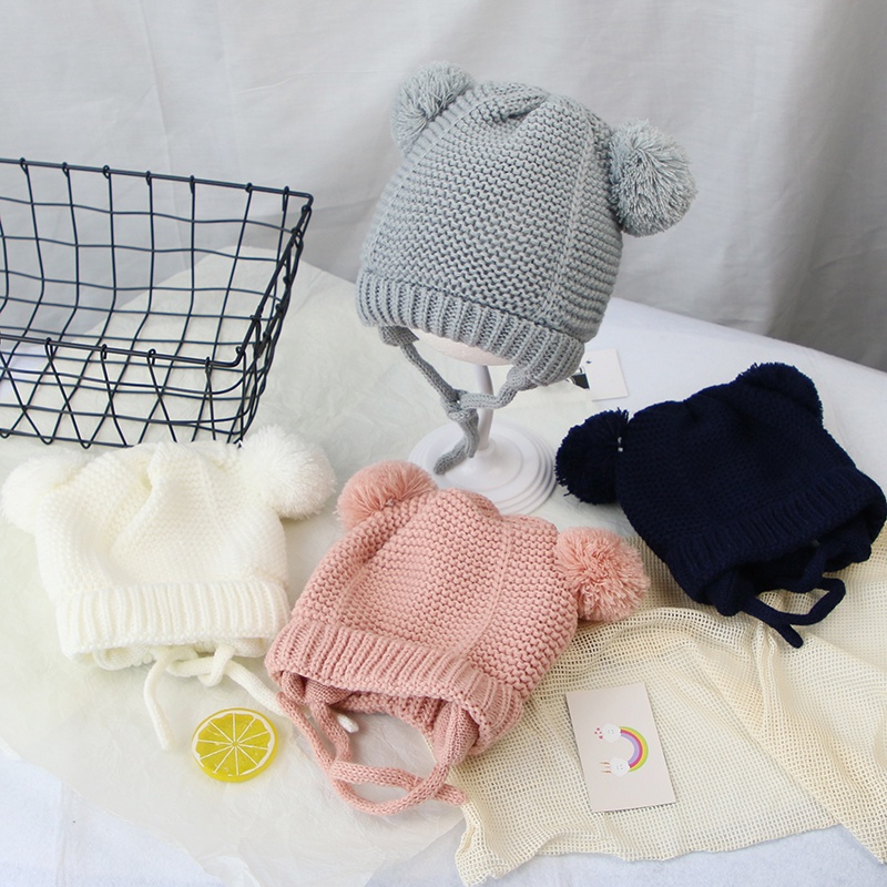 Mũ dệt kim mềm mại thiết kế hình tai thỏ phối quả bóng lông xù ấm áp màu trơn thiết kế dễ thương cho bé