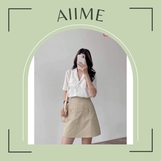 Set áo sơ mi trắng cổ vest tay ngắn mix chân váy kaki dáng chữ A