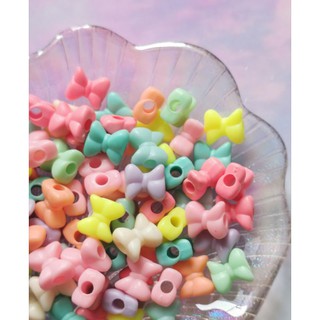 Hạt nhựa nơ dún màu pastel xỏ lỗ 2 đầu