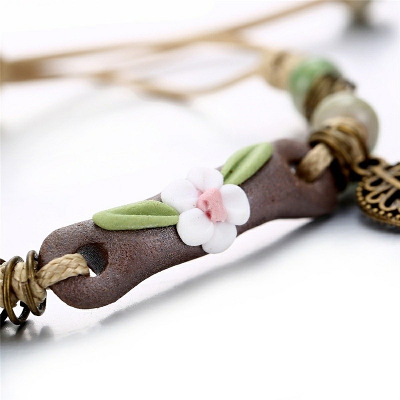 Vòng tay đất sét hoa charm chiếc lá