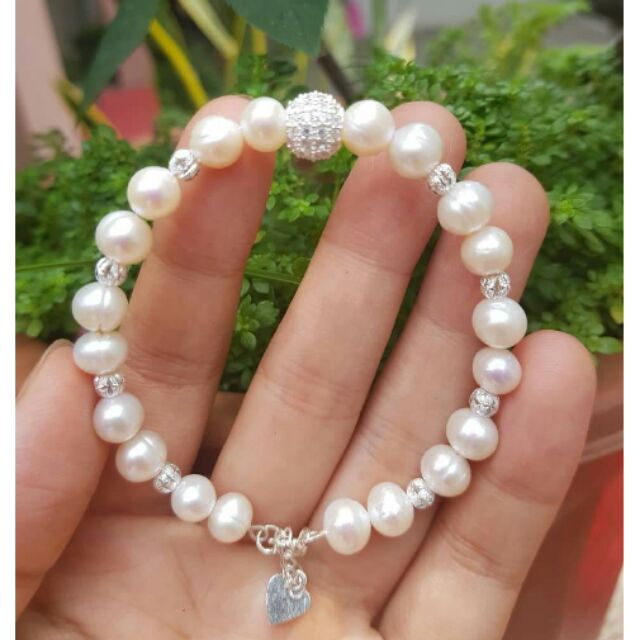 Vòng tay trai nuôi phối bạc