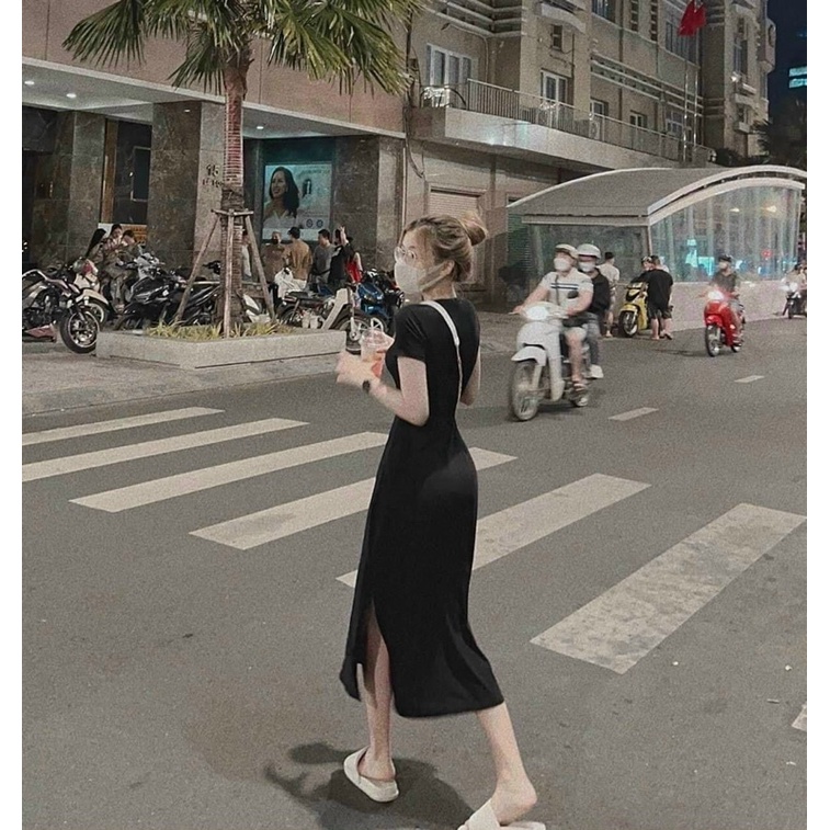 ĐẦM MIDI THUN ĐEN CỔ TRÒN XẺ TÀ