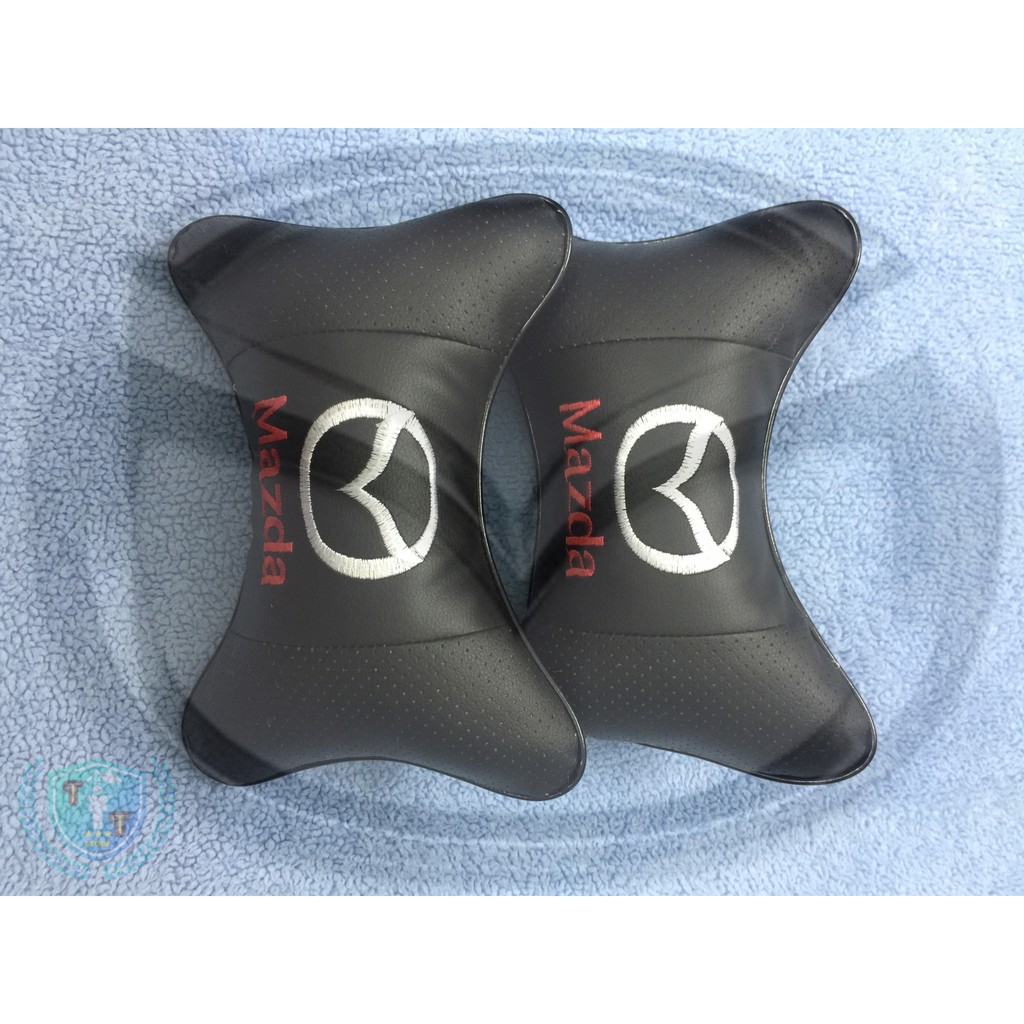 Gối tựa đầu bằng da cho ghế xe ô tô có gắn logo của các hãng xe | BigBuy360 - bigbuy360.vn