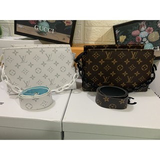 Clutch cầm tay dây xích