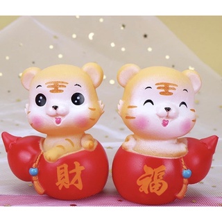 mô hình chú hổ vàng trang trí bánh kem