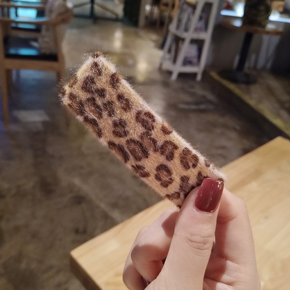 Kẹp tóc hình lông vũ thời trang