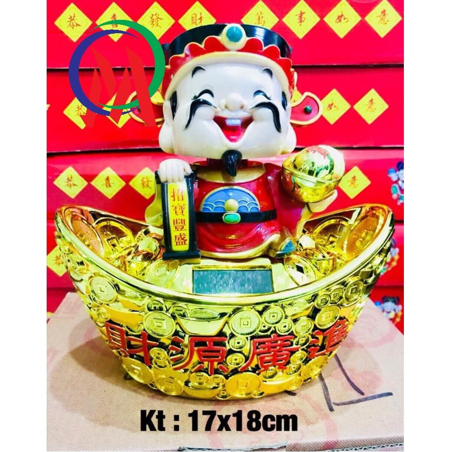 Ông thần tài ngồi thỏi vàng