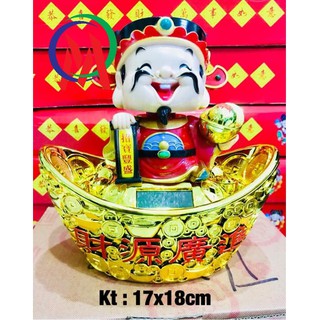 Ông thần tài ngồi thỏi vàng