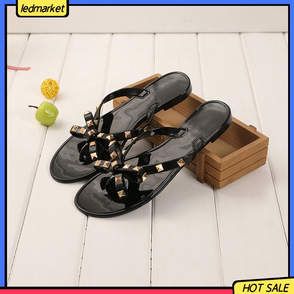 Dép đi biển phối nơ và đinh thời trang mùa hè dành cho nữ