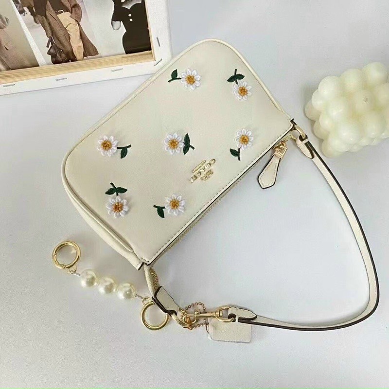 TÚI COACH NOLITA HOA CÚC