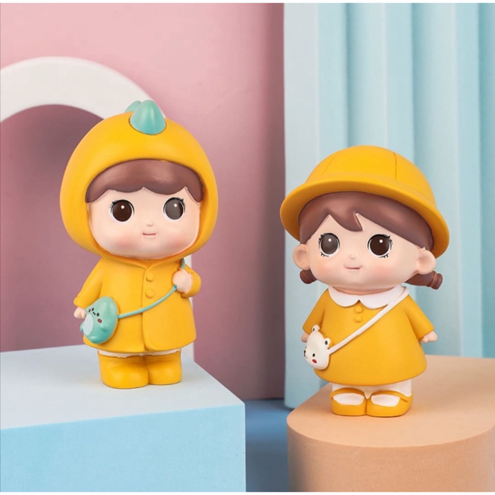 tượng em bé vàng túi xách đáng yêu
