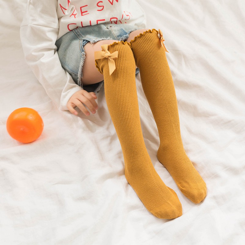 Tất dài chất liệu cotton đính nơ thời trang dành cho bé gái