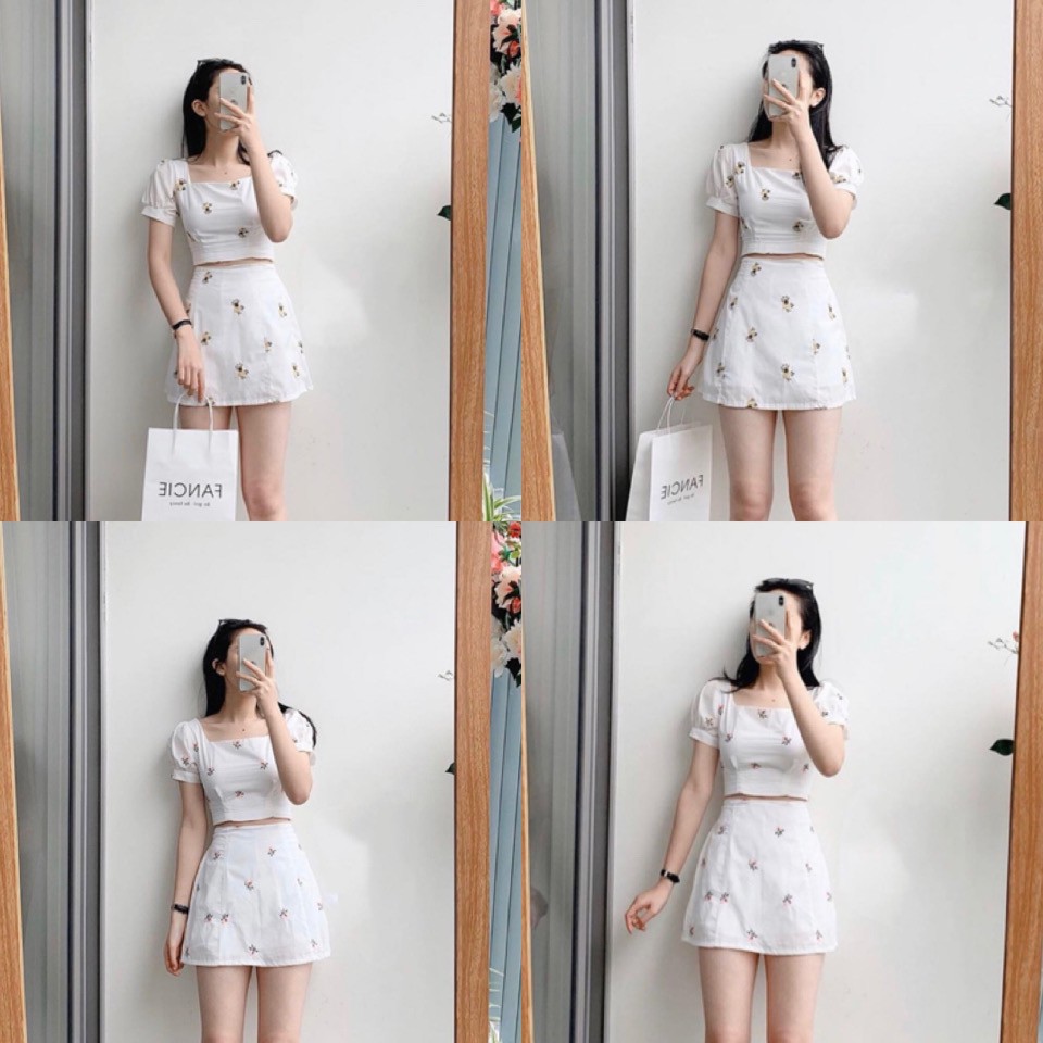 Set đồ gồm chân váy ngắn và áo croptop tay phồng hoạ tiết hoa nhí