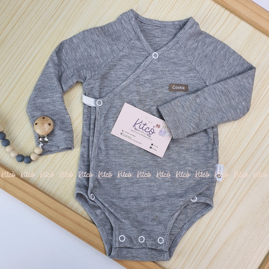 COOKIE Bodysuit dài tay vạt chéo