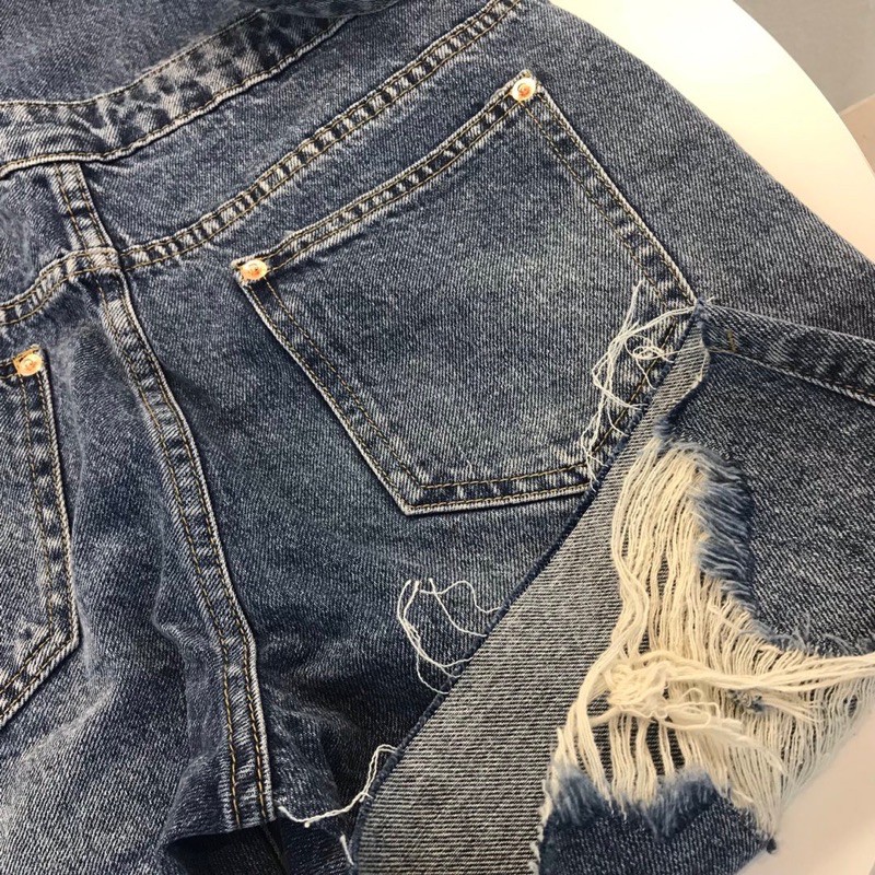 Quần yếm jeans ống lửng Balenciaga